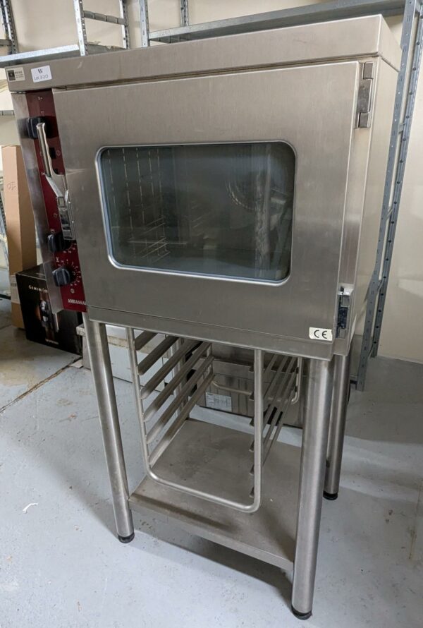 Four de marque Ambassade sur support en inox alimentaire ouvrant par 1 porte. (Pas de prise électrique). 150 x 75 x 64 cm. (Belgrand ssol-1 cuisine)
