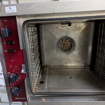 Four de marque Ambassade sur support en inox alimentaire ouvrant par 1 porte. (Pas de prise électrique). 150 x 75 x 64 cm. (Belgrand ssol-1 cuisine)