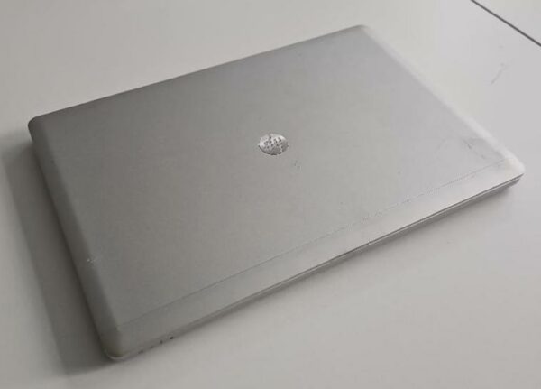 Ordinateur portable de marque HP modèle folio 94 70 M processeur Intel insight corps i7 pro. Localisation : 10 rue du Ballon - 93160 Noisy-le-Grand